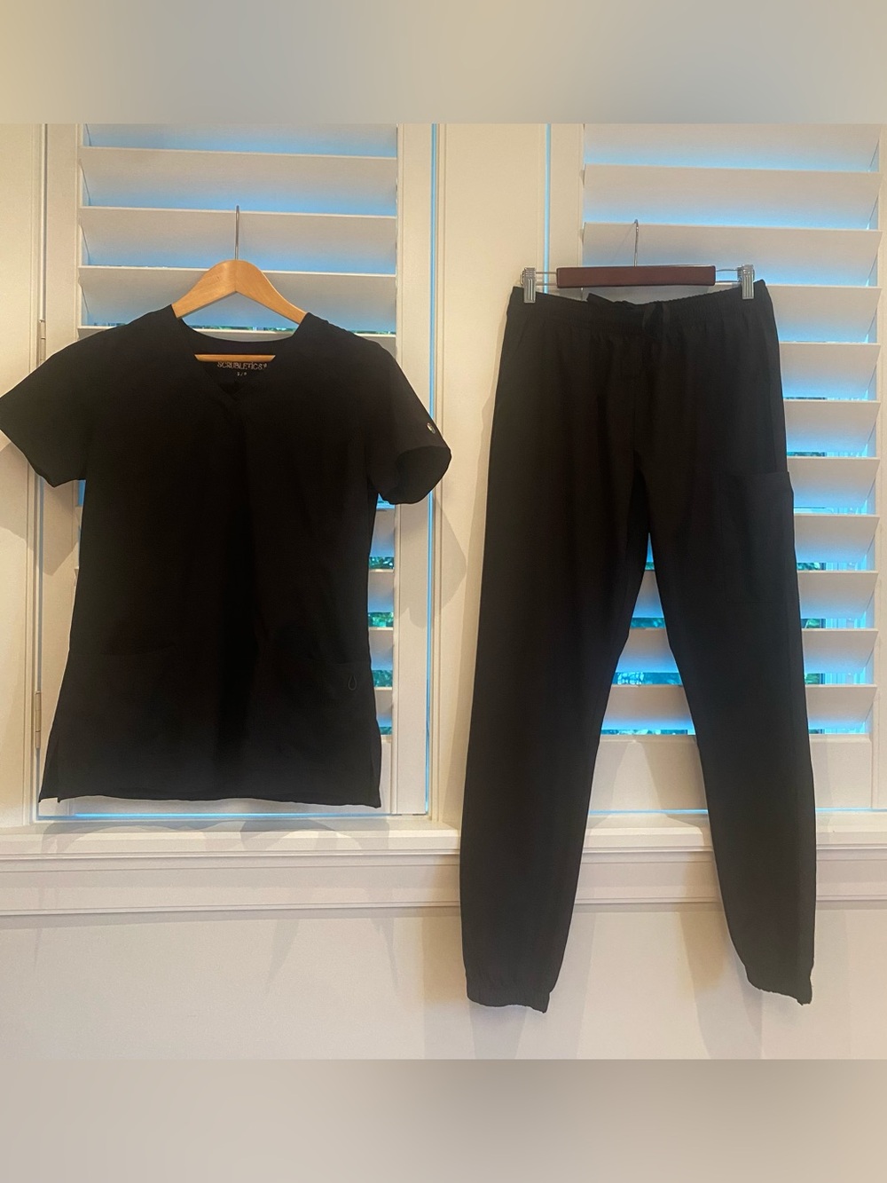 Scrubs Black Women's - Jogger Style Pants. Top is a small and bottom medium
